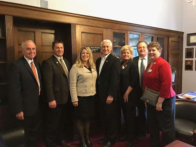 The group meets with Rep. Dave Reichert (center).