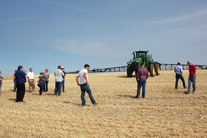 The first stop was at Green View Farms to introduce the group to the equipment that is used to grow and harvest wheat, included this spray tractor.