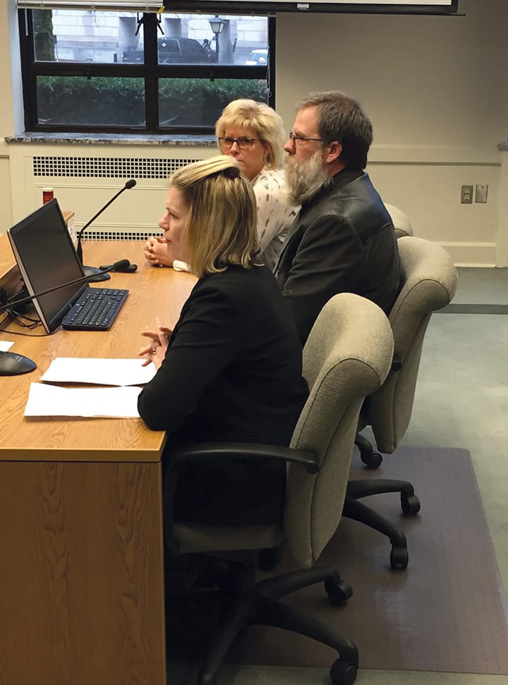 (From left to right) WAWG Lobbyist Diana Carlen and Benton County wheat growers Chad Smith and Nicole Berg testify in front of the Washington State Senate's ag committee in support of SB 5051, a bill that would change the early termination notification language in the state Department of Natural Resources' leases from 60 days to 180 days. The bill would also require written documentation demonstrating that the department has included the leased land in a plan for higher and better use, land exchange or sale.