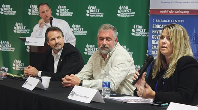 Michelle Hennings, executive director of the Washington Association of Wheat Growers, was a panelist at the final farm hall series held by the Washington Policy Center. Hennings answered questions about issues facing growers, including the Hirst decision that restricts exempt wells; the capital budget; taxes; and trade issues. Also on the panel were Aaron Golladay (second from right), 1st vice president of the Washington Farm Bureau, and Chris Voigt, executive director of the Washington State Potato Commission. Chris Cargill from the Washington Policy Center moderated the discussion.