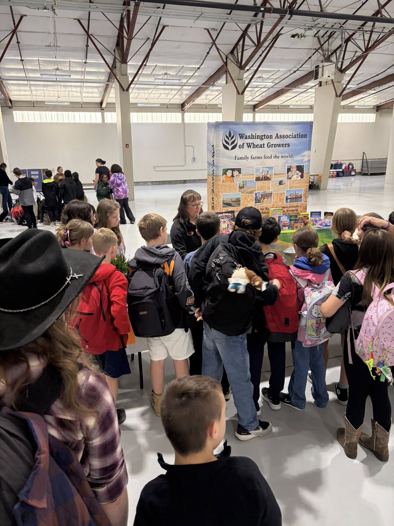 Students at wheat growers educational booth
